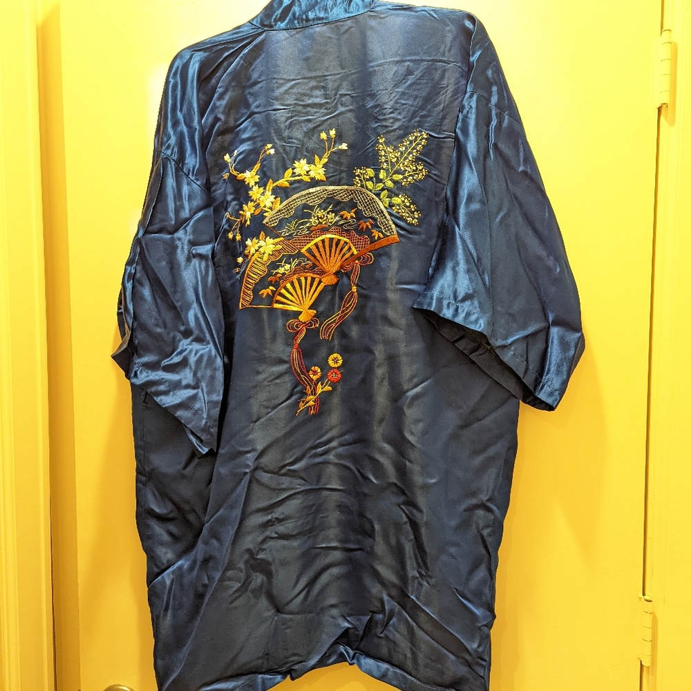 100% silk with embroidery in royal blue